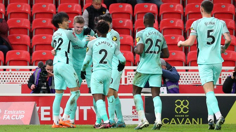 Brighton's Evan Ferguson (second left) celebrates with team-mates after scoring the opener against Stoke