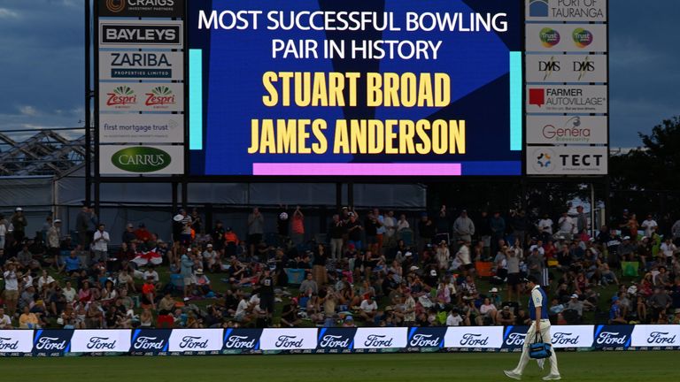 A sign signals an achievement by England's Stuart Broad and James Anderson on the third day of their cricket test match against New Zealand in Tauranga, New Zealand, Saturday, Feb. 18, 2023. (Andrew Cornaga/Photosport via AP)