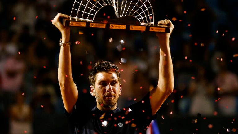 Cameron Norrie of the United Kingdom holds the trophy of the Rio Open Tennis tournament after defeating Spain&#39;s Carlos Alcaraz, in Rio de Janeiro, Brazil, Sunday, Feb. 26, 2023. (AP Photo/Bruna Prado)