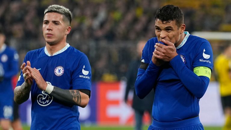 Chelsea's Enzo Fernandez, left, is flanked by his team-mate Thiago Silva at the end of the Dortmund game