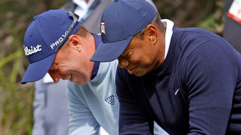 Tiger Woods, right, jokes with Justin Thomas as they wait to tee off on the fourth hole during the first round of the Genesis Invitational golf tournament at Riviera Country Club, Thursday, Feb. 16, 2023, in the Pacific Palisades area of Los Angeles. (AP Photo/Ryan Kang)