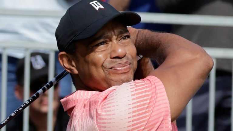 Tiger Woods hits off the first tee during the first round of the PNC Championship golf tournament Saturday, Dec. 17, 2022, in Orlando, Fla. (AP Photo/Kevin Kolczynski)