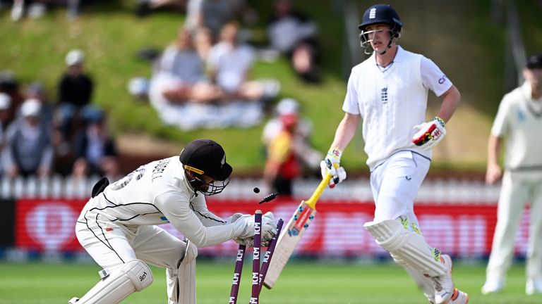 New Zealand&#39;s Tom Blundell, left, runs out England&#39;s Harry Brook on day 5 of their cricket test match in Wellington, New Zealand, Tuesday, Feb 28, 2023. (Andrew Cornaga/Photosport via AP)
