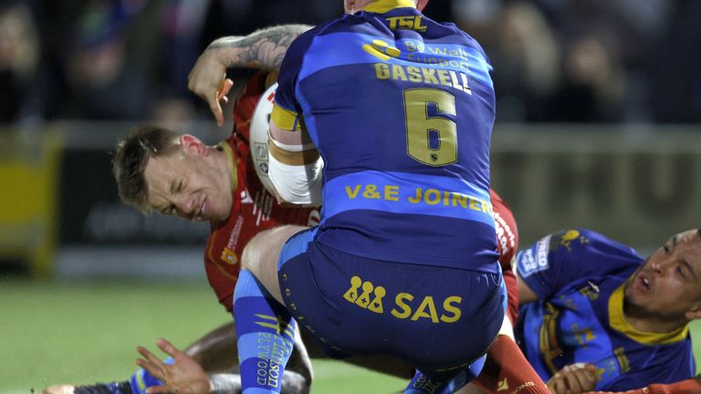 Tom Johnstone ran in three tries to help Catalans defeat Wakefield