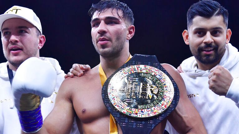 Tommy Fury, center, celebrates after defeating Jake Paul in a boxing match in Riyadh, Saudi Arabia, late Sunday, Feb. 26, 2023. (AP Photo)