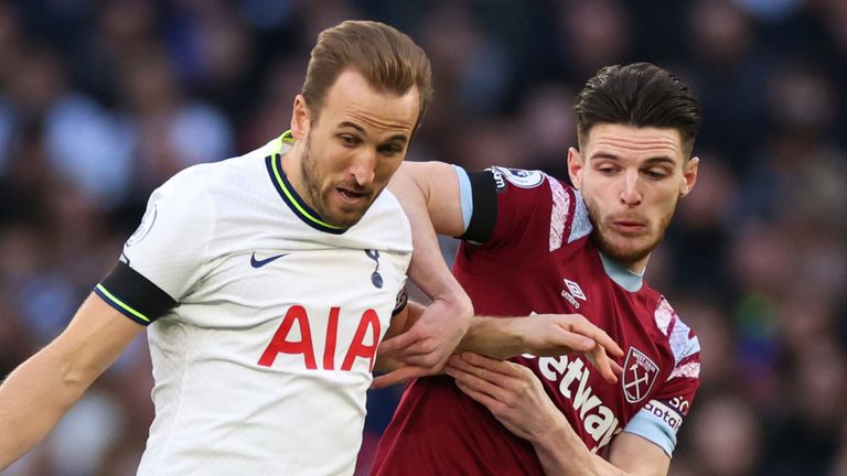 Declan Rice makes a challenge on Harry Kane