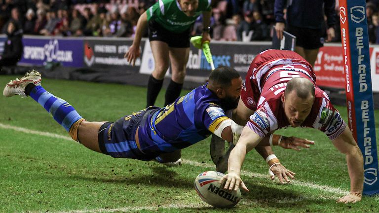 Picture by Paul Currie/SWpix.com - 24/02/2023 - Rugby League - Betfred Super League Round 2 - Wigan Warriors v Wakefield Trinity - DW Stadium, Wigan, England - Liam Marshall of Wigan Warrior scores the 4th try
