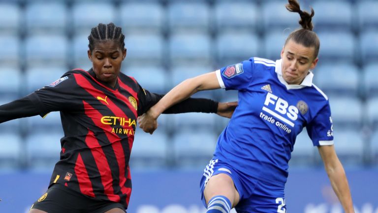 Khadija Shaw competes for the ball with Ashleigh Plumptre