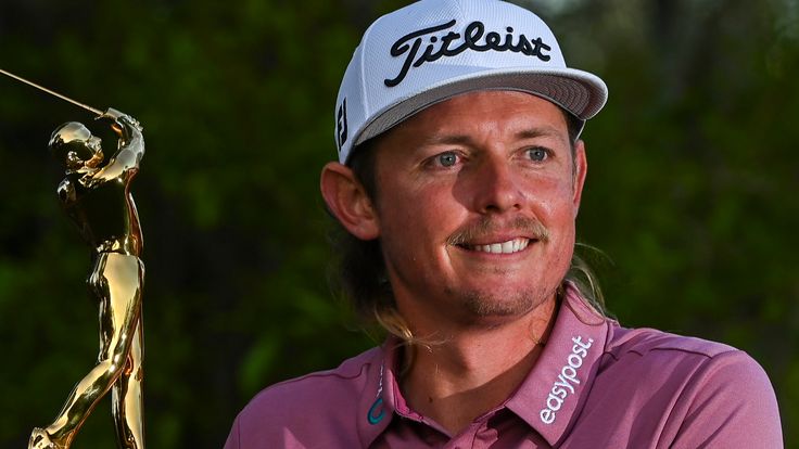 PONTE VEDRA BEACH, FL - MARCH 14:  Cameron Smith of Australia smiles with the trophy following his one stroke victory during the final round of THE PLAYERS Championship on the Stadium Course at TPC Sawgrass on March 14, 2022, in Ponte Vedra Beach, Florida. (Photo by Keyur Khamar/PGA TOUR via Getty Images)