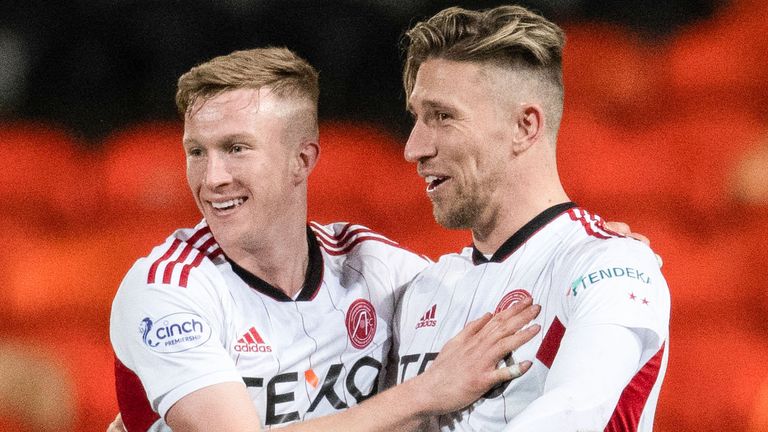 DUNDEE, SCOTLAND - MARCH 04: Ross McCrorie of Aberdeen celebrates with Angus MacDonald after scoring to make it 2-1 during a Premiership cinch match between Dundee United and Aberdeen at Tannadice Park on March 04, 2023, in Dundee, in Scotland.  (Photo by Mark Scates/SNS Group)