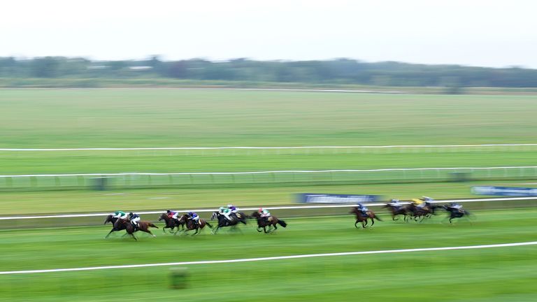 Al Mubhir ridden by William Buick (left) wins the MansionBet Beaten By A Head Maiden Stakes on Sun Chariot Day at Newmarket 