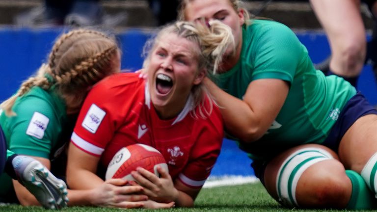 Wales' Alex Callender (second right) celebrates after scoring the first try of the game