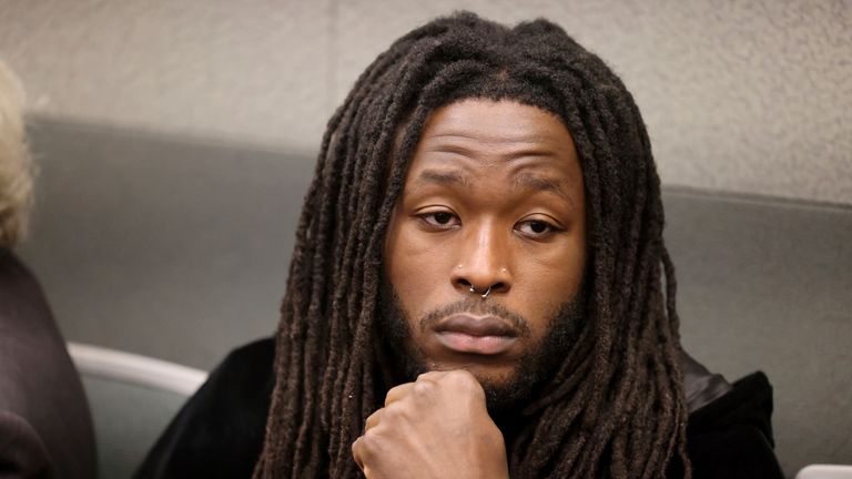 New Orleans Saints running back Alvin Kamara waits for an arraignment at the Regional Justice Center in Las Vegas, Thursday, March 2, 2023. Kamara and three other men pleaded not guilty Thursday in Nevada to charges they beat a man unconscious at a Las Vegas Strip nightclub before the NFL...s 2022 Pro Bowl. (K.M. Cannon/Las Vegas Review-Journal via AP)