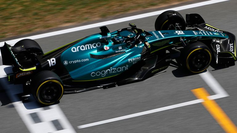 Lance Stroll drives Aston Martin's revised AMR22 at the Spanish GP in 2022