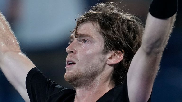 Andrey Rublev celebrates after he beats Germany&#39;s Alexander Zverev during their semi final match of the Dubai Duty Free Tennis Championships in Dubai, United Arab Emirates, Friday, March 3, 2023. (AP Photo/Kamran Jebreili)