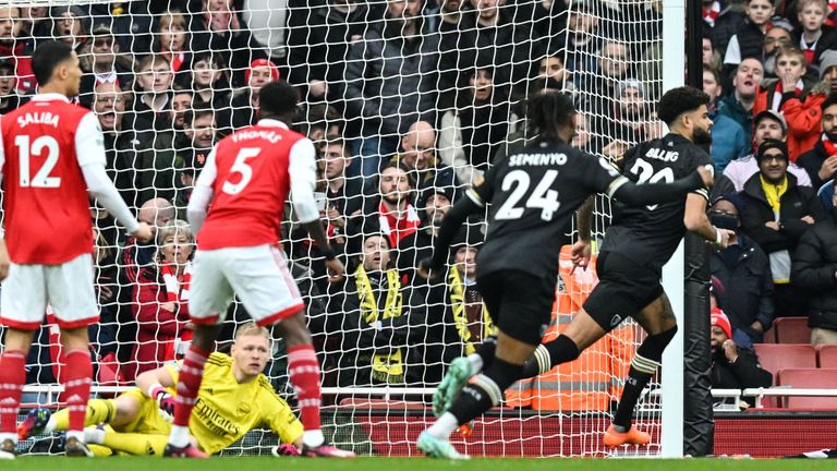 Philip Billing wheels away to celebrate after giving Bournemouth an early lead at Arsenal