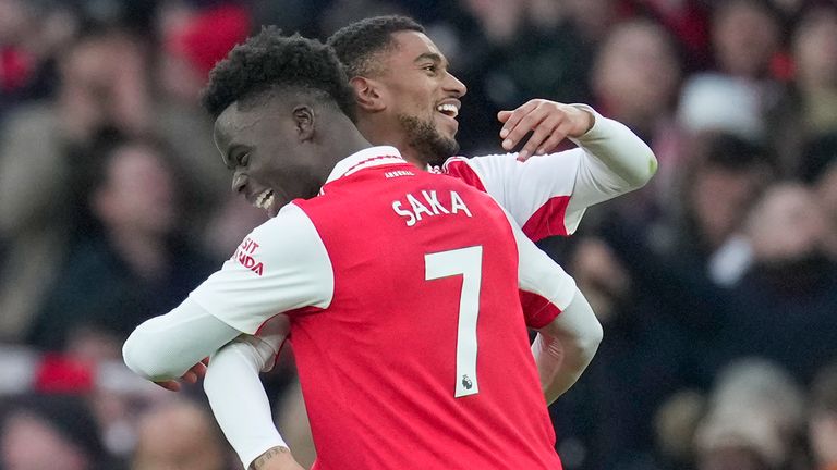 Reiss Nelson is hugged by Bukayo Saka after scoring a late winner for Arsenal against Bournemouth