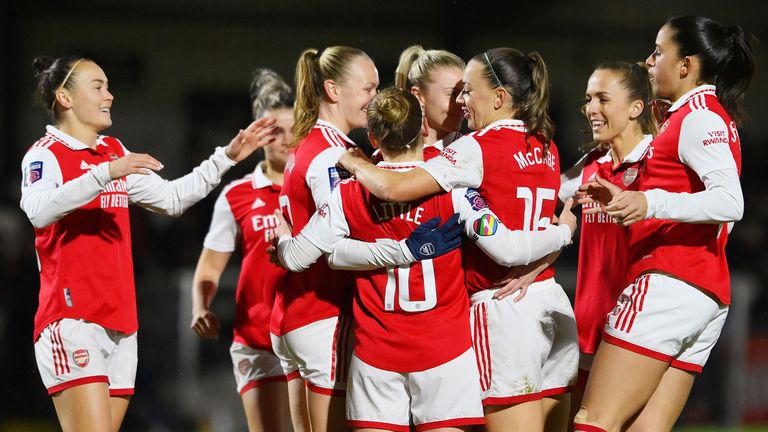 Kim Little celebrates with Arsenal team-mates after scoring against Reading