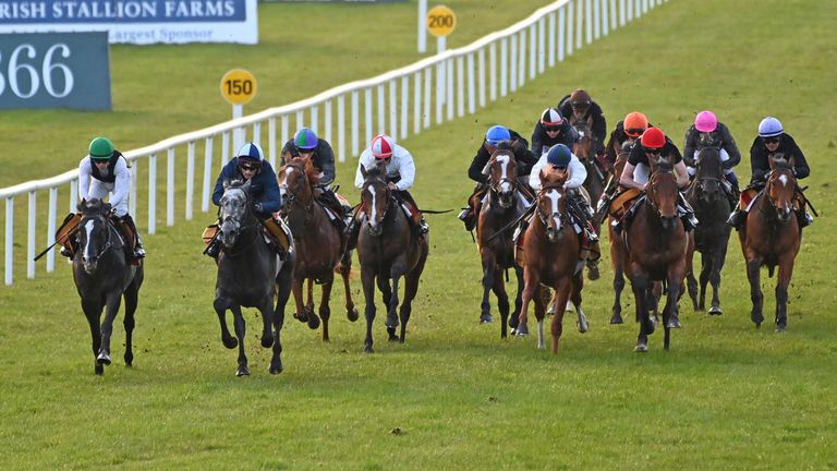 Auguste Rodin (green cap) leads the Aidan O'Brien string in a workout at the Curragh