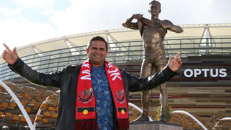 PERTH, AUSTRALIA - JULY 06: Nicky Winmar poses with his statue during the Nicky Winmar statue unveiling at Optus Stadium on July 06, 2019 in Perth, Australia. (Photo by Paul Kane/Getty Images)
