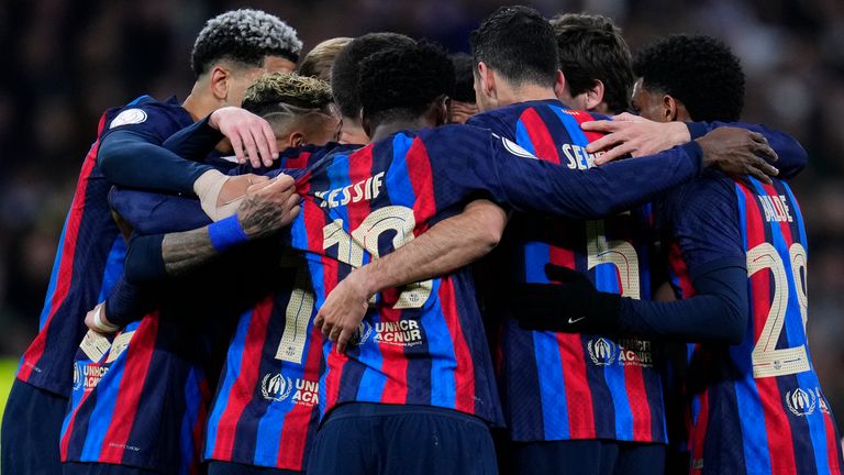 Barcelona players celebrate after going ahead