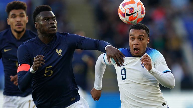 France's Benoit Badiashile and England's Cameron Archer battle for the ball