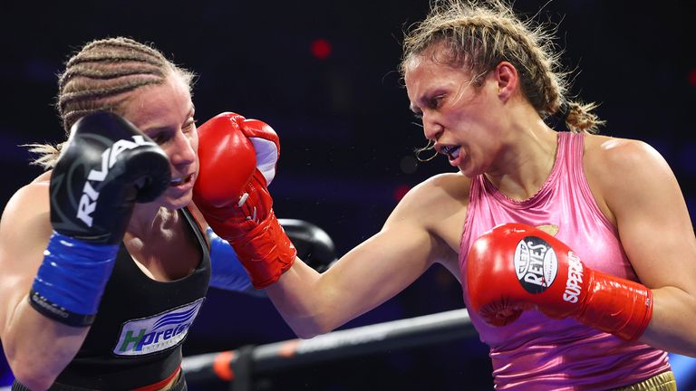 FRESNO, CALIFORNIA - MARCH 25: Tina Rupprecht (L) and Seniesa Estrada (R) exchange punches during their WBA & WBC minimumweight unification championship fight at Save Mart Center on March 25, 2023 in Fresno, California. (Photo by Mikey Williams/Top Rank Inc via Getty Images)