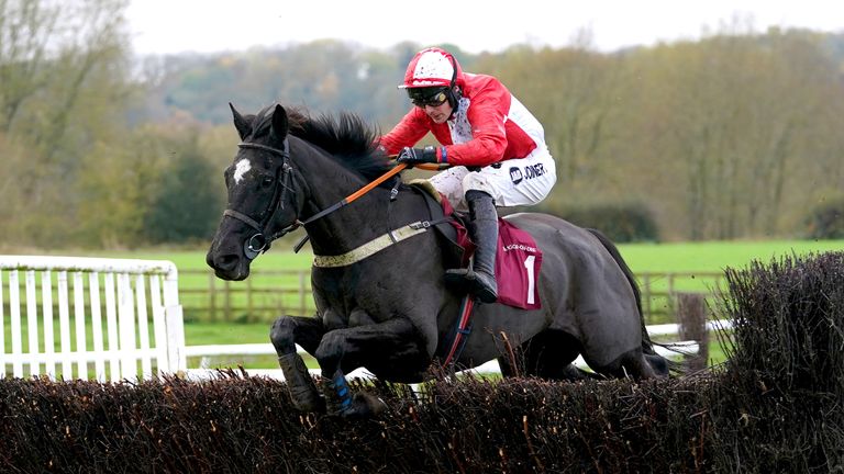 Burrows Diamond and Ryan Mania clear a fence as they compete in the Yorton Stallions Mares&#39; Novices&#39; Chase at Bangor-on-Dee