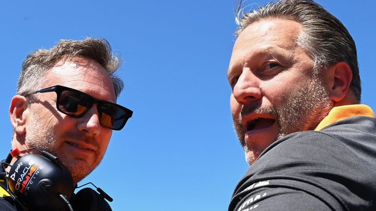 CIRCUIT GILLES-VILLENEUVE, CANADA - JUNE 19: Christian Horner, Team Principal, Red Bull Racing, and Zak Brown, CEO, McLaren Racing, on the grid during the Canadian GP at Circuit Gilles-Villeneuve on Sunday June 19, 2022 in Montreal, Canada. (Photo by Mark Sutton / Sutton Images)