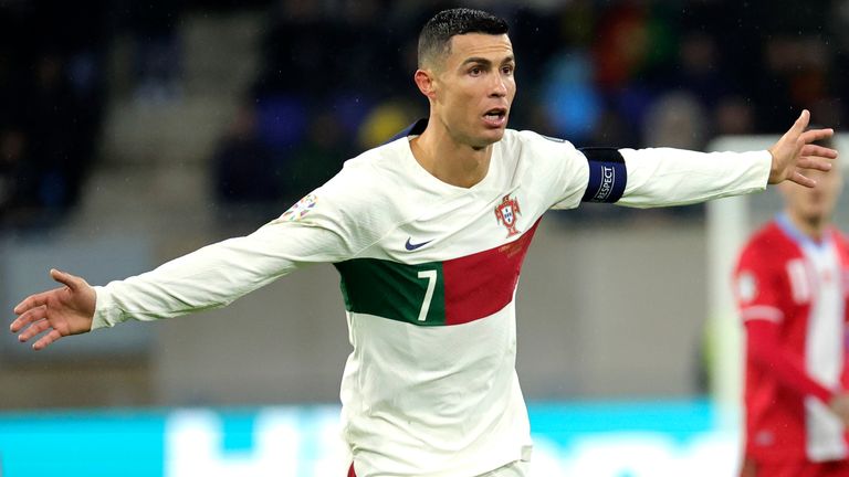 Portugal's Cristiano Ronaldo, center, in action during the Euro 2024 group J qualifying soccer match between Luxembourg and Portugal at the Stade de Luxembourg in Luxembourg, Sunday, March 26, 2023. (AP Photo/Olivier Matthys)