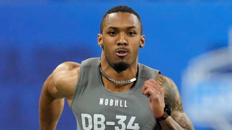 Michigan defensive back DJ Turner II runs the 40-yard dash at the NFL football scouting combine in Indianapolis