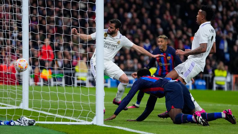 Real Madrid&#39;s Eder Militao puts the ball into his own net during the Bernabeu meeting