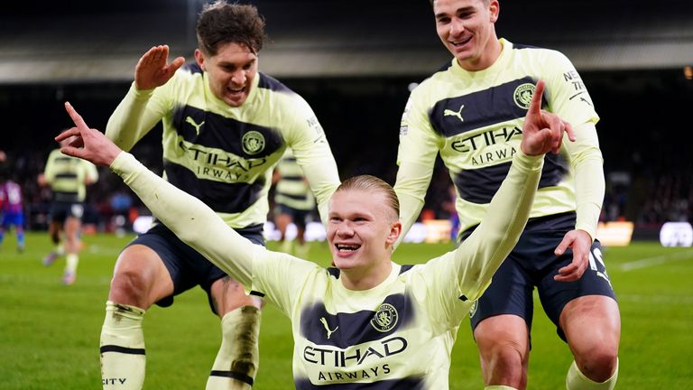 Manchester City&#39;s Erling Haaland celebrates after scoring their first goal of the game 