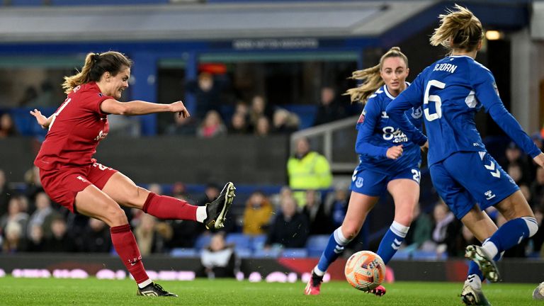 Katie Stengel of Liverpool Women scores against Everton
