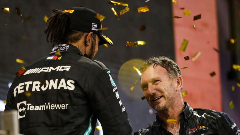 # 44 Lewis Hamilton (GBR, Mercedes-AMG Petronas F1 Team), Christian Horner (GBR, Red Bull Racing), F1 Grand Prix of Abu Dhabi at Yas Marina Circuit on December 12, 2021 in Abu Dhabi, United Arab Emirates. (Photo by HOCH ZWEI) Photo by: HOCH ZWEI/picture-alliance/dpa/AP Images