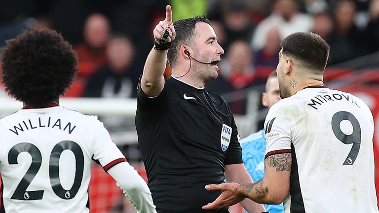 Aleksandar Mitrovic is sent off after shoving referee Chris Kavanagh