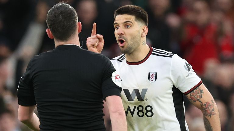 Aleksandar Mitrovic gets into a loud argument with referee Chris Kavanagh before being sent off