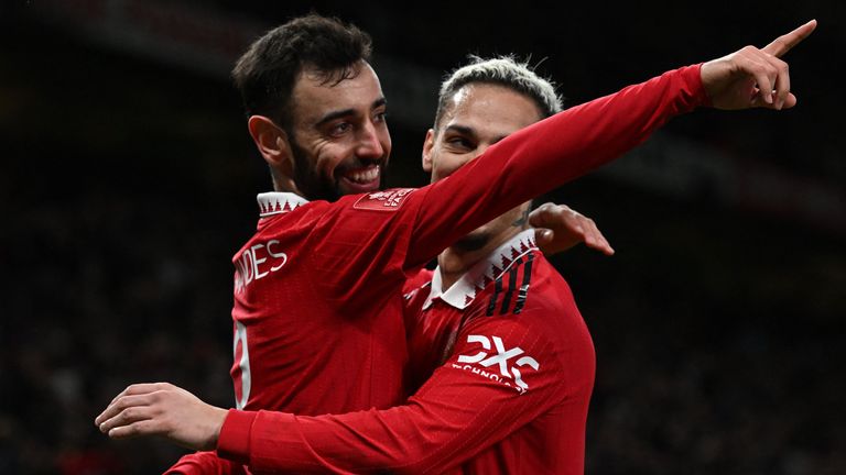 Bruno Fernandes celebrates with Antony after scoring Manchester United&#39;s third goal against Fulham