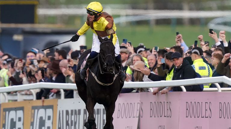Paul Townend celebrates winning the Cheltenham Gold Cup on Galopin Des Champs for trainer Willie Mullins