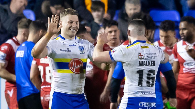 Picture by Allan McKenzie/SWpix.com - 02/03/2023 - Rugby League Round 3 - Betfred Super League - Warrington Wolves v Salford Red Devils - Halliwell Jones Stadium, Warrington, England - Warrington's George Williams celebrates his try against Salford with Danny Walker.