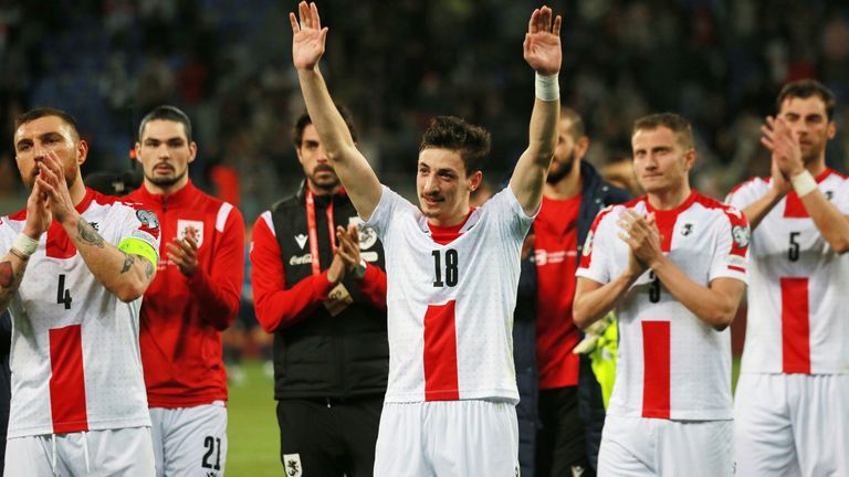 Georgia's players applaud to fans after the Euro 2024 group A qualifying soccer match between Georgia and Norway at the AdjaraBet Arena in Batumi, Georgia, Tuesday, March 28, 2023. (AP Photo/Zurab Tsertsvadze)