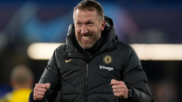 Chelsea's head coach Graham Potter celebrates on the pitch after the end of the Champions League second round football match between Chelsea FC and Borussia Dortmund at Stamford Bridge, London, on Tuesday March 7, 2023.  Chelsea won the tie 2-1 two legs.  (AP Photo/Alastair Grant)