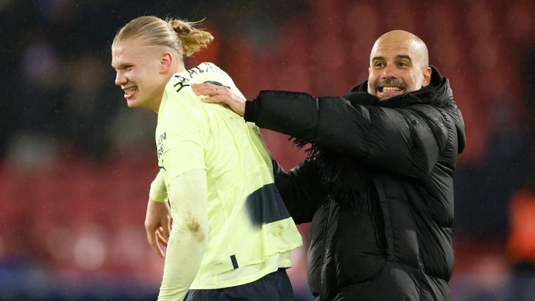 Manchester City&#39;s head coach Pep Guardiola, right, and striker Erling Haaland