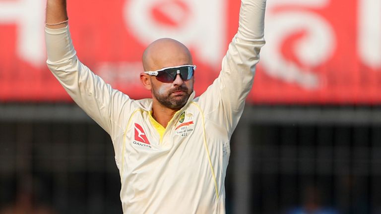 Australia's Nathan Lyon acknowledges the crowed after taking eight wickets during the second day of third cricket test match between India and Australia in Indore, India, Thursday, March 2, 2023. (AP Photo/Surjeet Yadav)