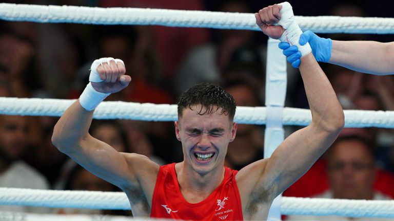 Wales' Ioan Croft celebrates after winning the Men's Welter (63.5-67kg) Final against Zambia's Stephen Zimba at The NEC on day ten of the 2022 Commonwealth Games in Birmingham