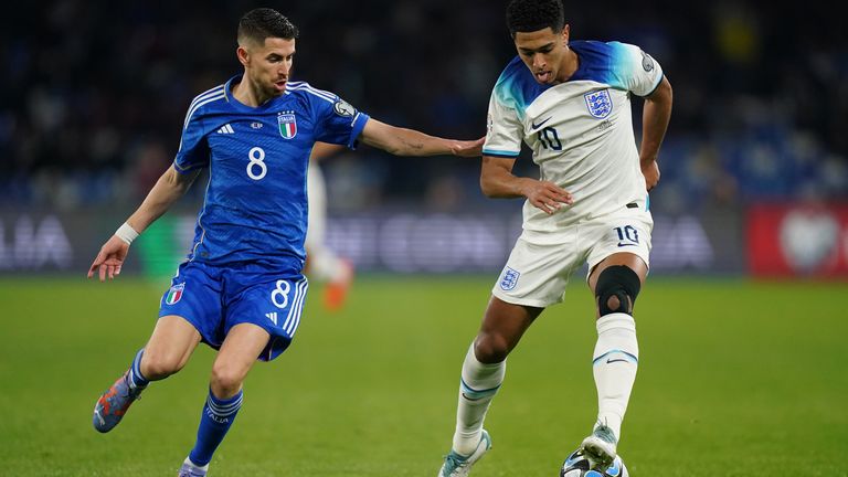 Italy&#39;s Jorginho and England&#39;s Jude Bellingham battle for the ball 