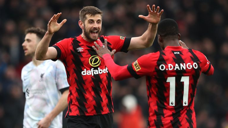 Bournemouth's Jack Stephens and Dango Ouattara celebrate the 1-0 win over Liverpool