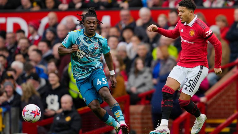 Manchester United&#39;s Jadon Sancho, right, challenges for the ball with Southampton&#39;s Romeo Lavia during the English Premier League soccer match between Manchester United and Southampton at Old Trafford stadium in Manchester, England, Sunday, March 12, 2023. (AP Photo/Jon Super)
