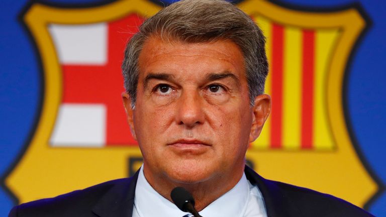 FILE - FC Barcelona club President Joan Laporta pauses during a news conference in Barcelona, Spain, on Aug. 6, 2021. Barcelona won...t be able to reduce its salary burden to acceptable limits for the club until several veteran players finish their contracts, its top financial officer said Thursday, Oct. 6, 2022. (AP Photo/Joan Monfort, File)