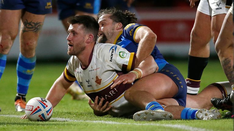 Joe Greenwood celebrates scoring the only try of the game in Huddersfield's win at Wakefield